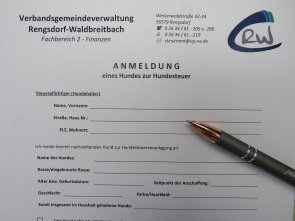 Formular mit Kugelschreiber